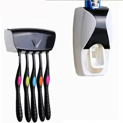 Set of five black toothbrushes with colorful bristles and toothpaste dispenser on a white background.
