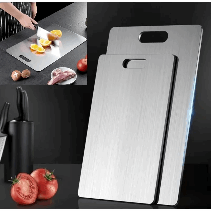 Two stainless steel cutting boards with a kitchen setting including tomatoes and knives.