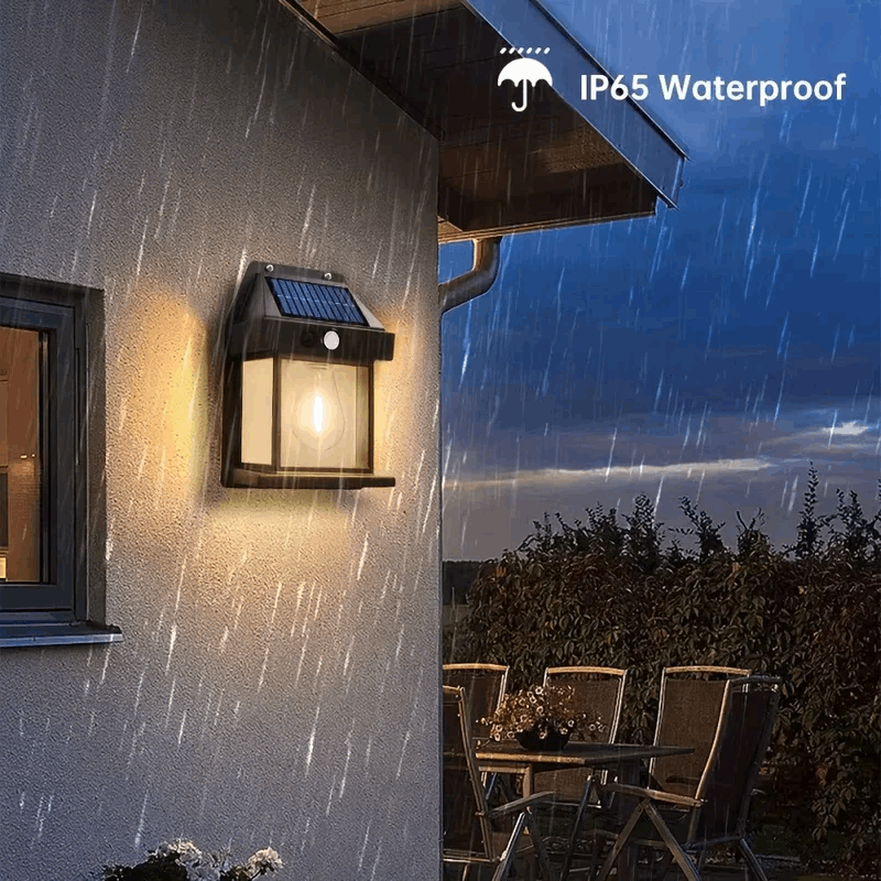 Solar outdoor light fixture on a wall with rain, IP65 waterproof label, and outdoor setting.